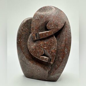 “The Embrace” hand-carved stone sculpture
